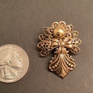 Beautiful little gold tone guardian angel pin …  hand crafted